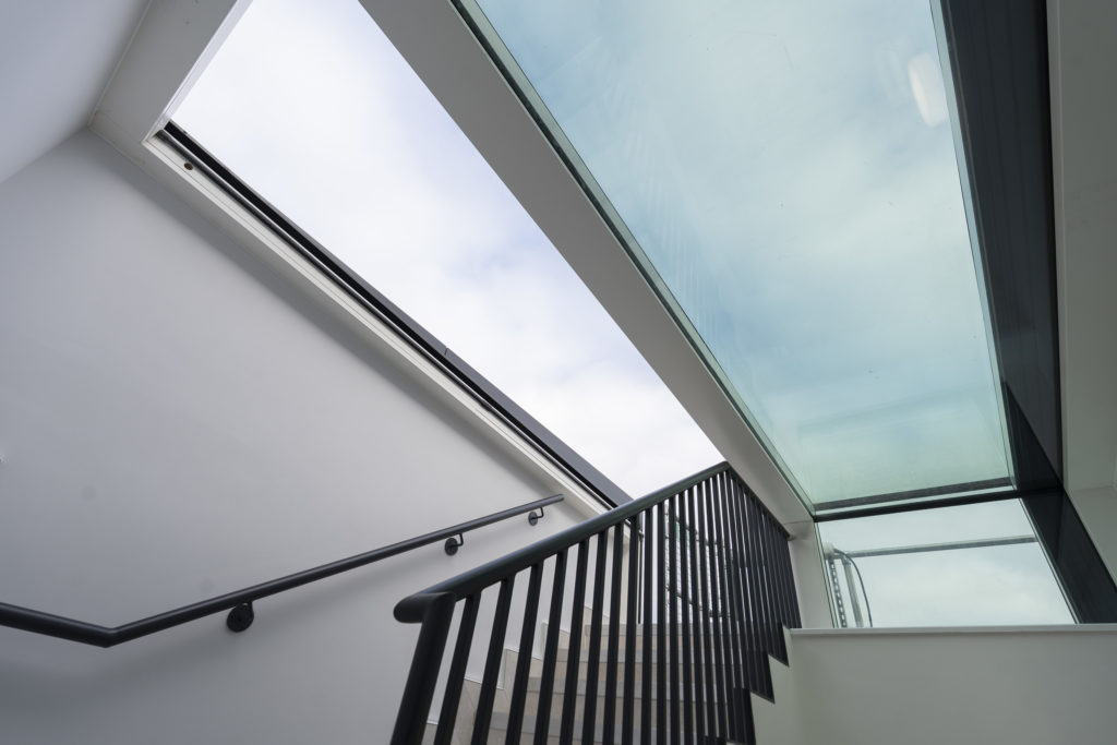 View from the stairwell looking up through the three-wall box rooflight glazing at 14 St John’s Lane.