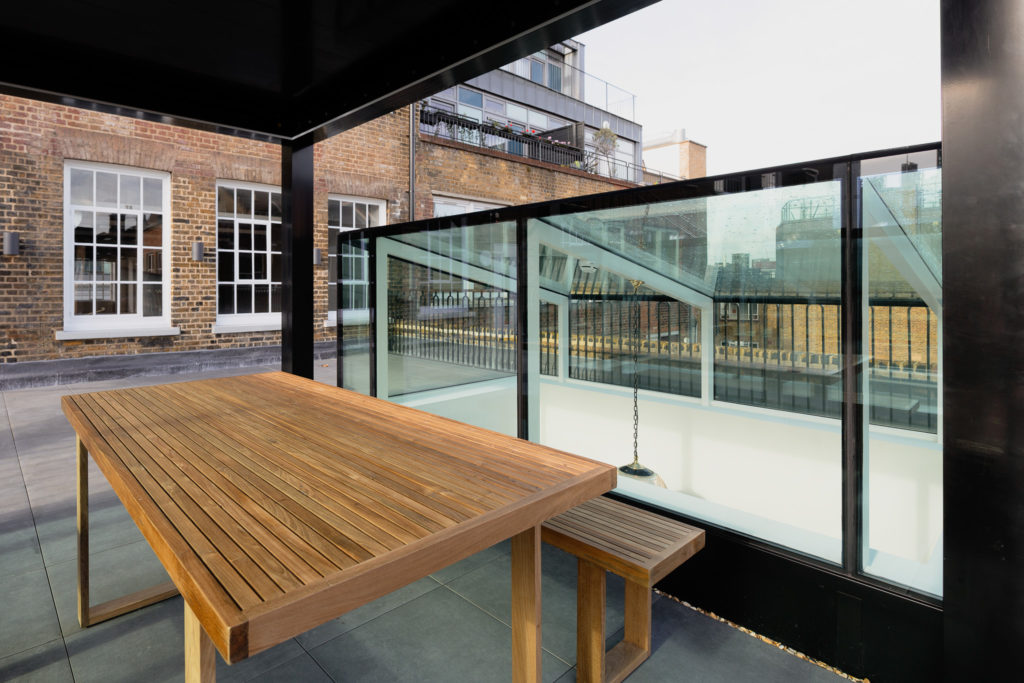Detail view of bespoke box rooflight glazing within London commercial refurbishment.