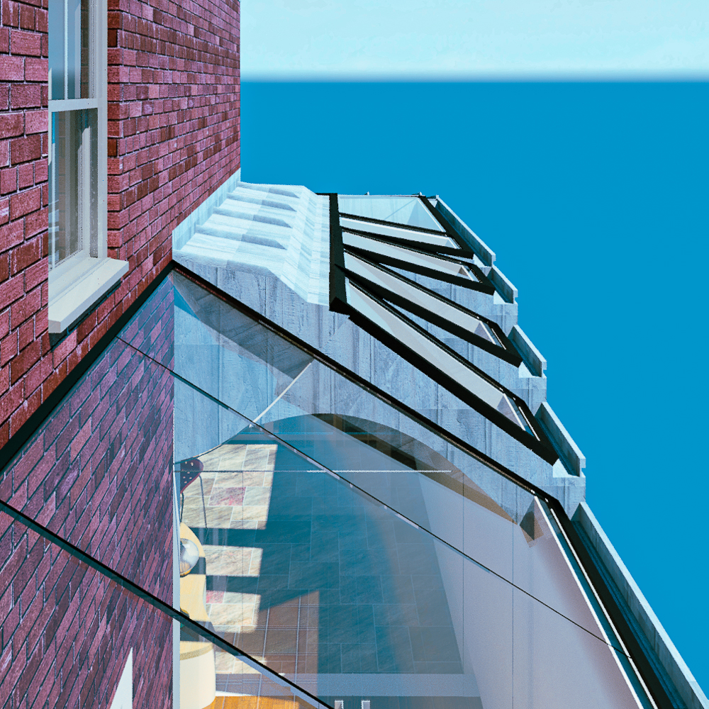 Rooftop glass extension on a brick building with a view of the sky, showcasing interior wooden flooring and metal framing.
