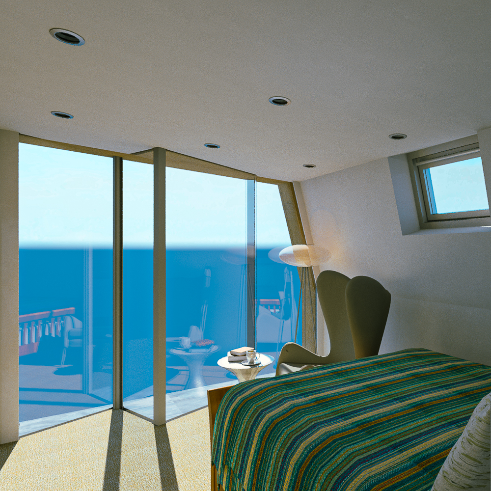 A bedroom with a striped bedspread, modern chair, and glass doors offering an ocean view. A small round table holds books and a lamp.