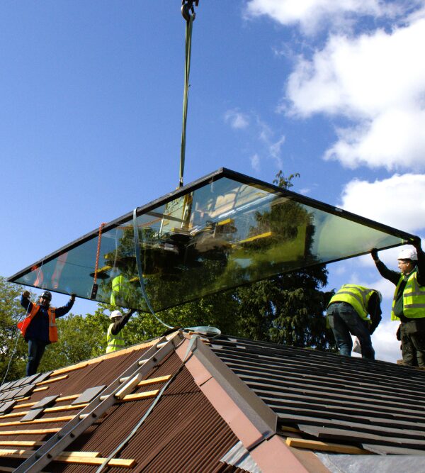Large Rooflight Being Lowered by Crane